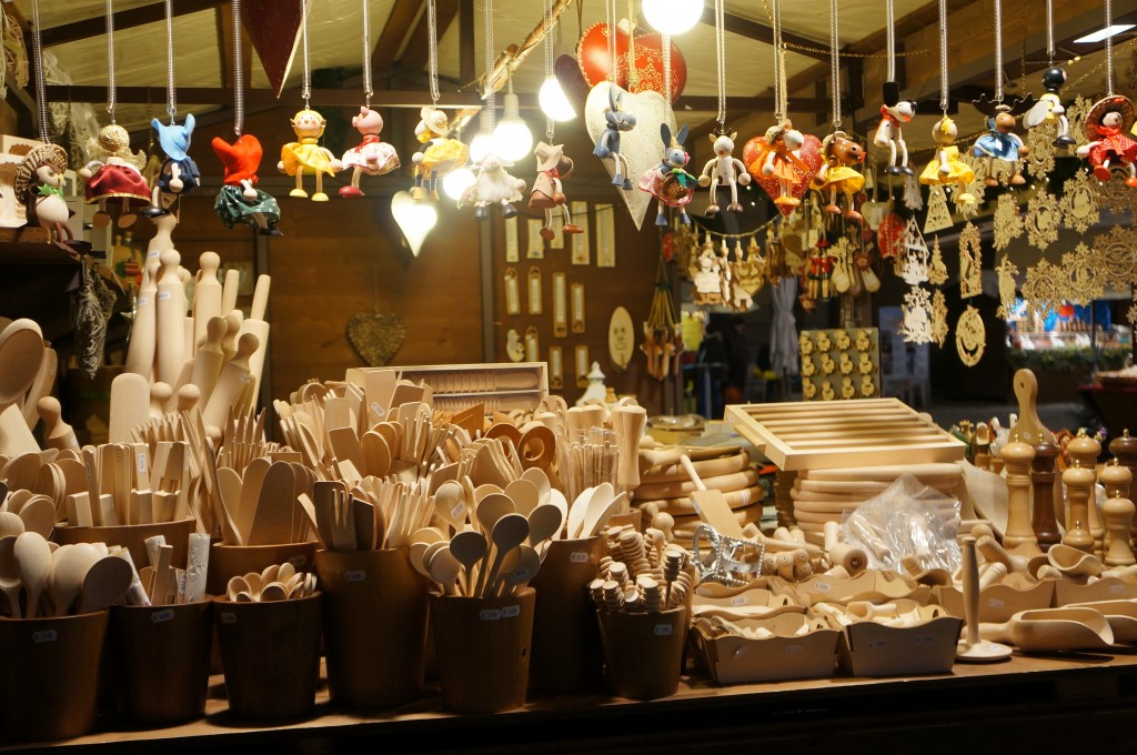 Christmas market stall selling wooden utensils and cooking implements